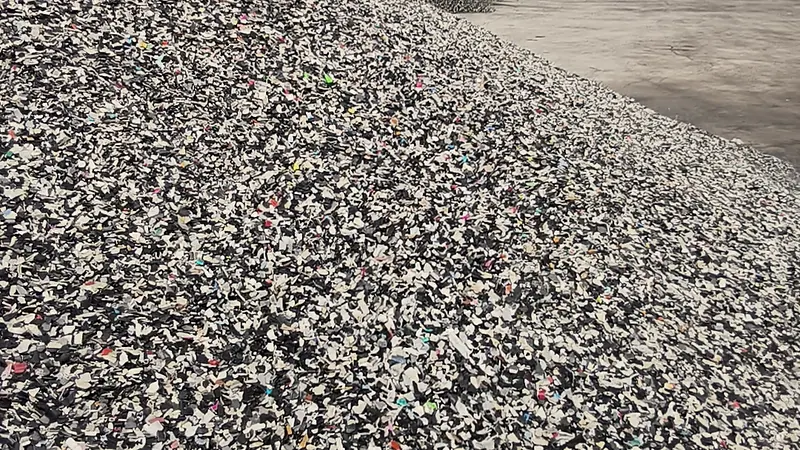 The crushed-flake stockpile under the shed
